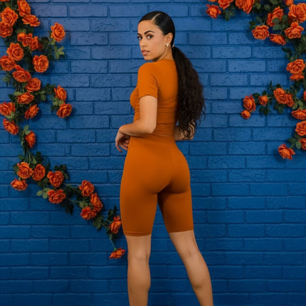 Urbn-cart burnt orange microfiber biker short set with short sleeve crop top and high-waisted shorts.