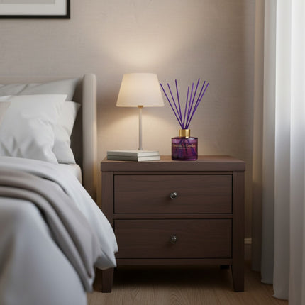 Urbn-cart purple glass reed diffuser with gold collar and purple reeds for home fragrance.