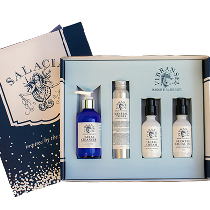 Urbn-cart Vibransea Skincare Gift Set with four products: facial cleanser, mineral toner, facial cream, and facial oil. Includes gift packaging.